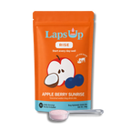 LapsUp Apple Berry Sunrise dog drink mix package with a spoon on a white background